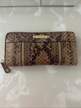 Snake-Print Zip Around Wallet in Brown